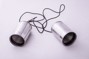 Tin can phoneline. Photo by Sebastien Wiertz. CC License: http://bit.ly/2jRqvXG
