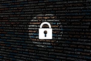 Computer code with lock symbolizing digital security.